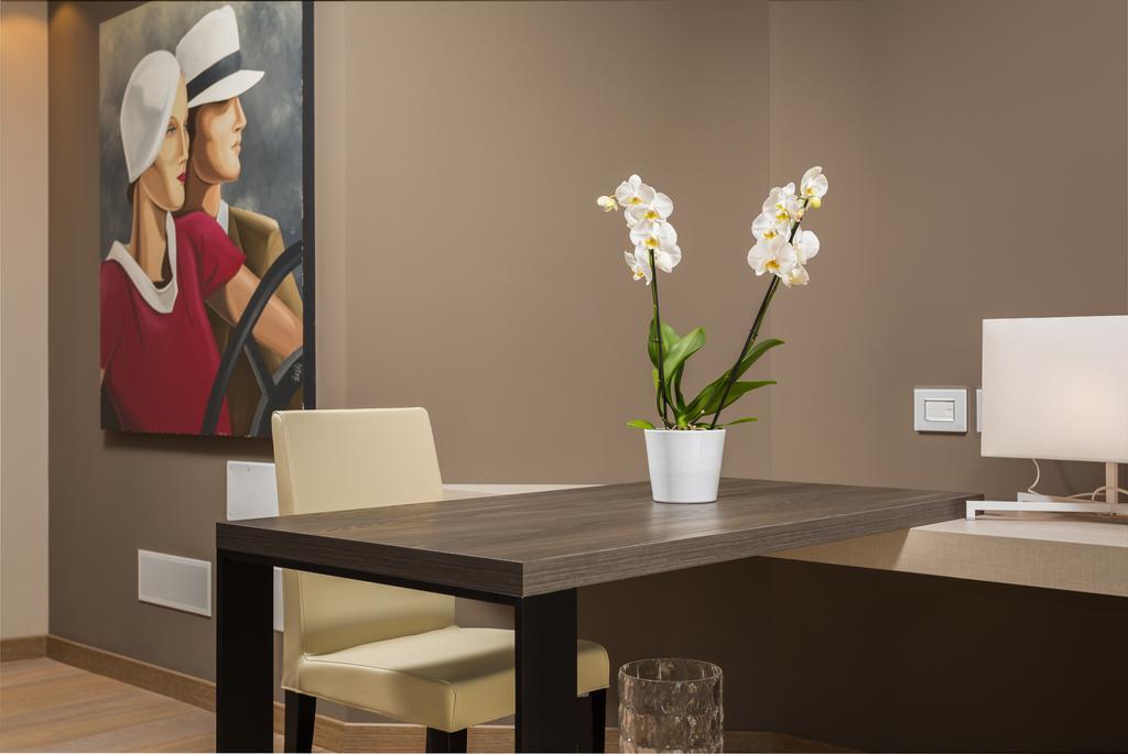 Suites Hotel Astor Беллуно Номер фото