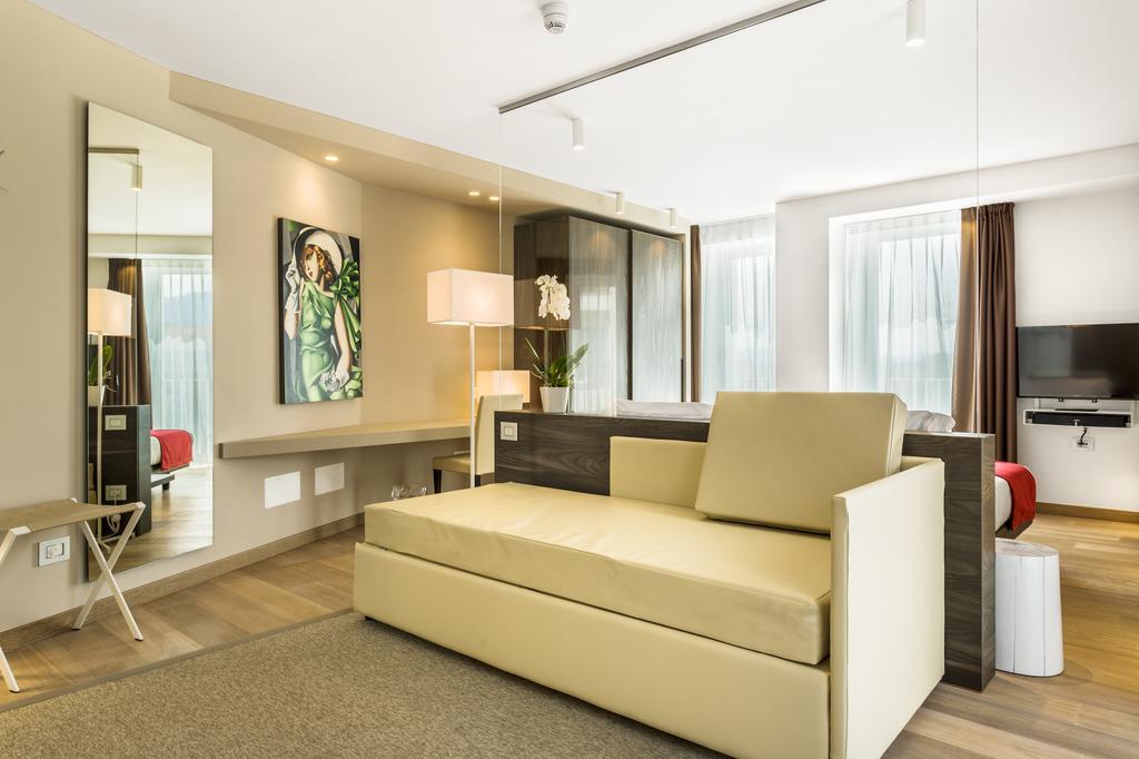 Suites Hotel Astor Беллуно Номер фото