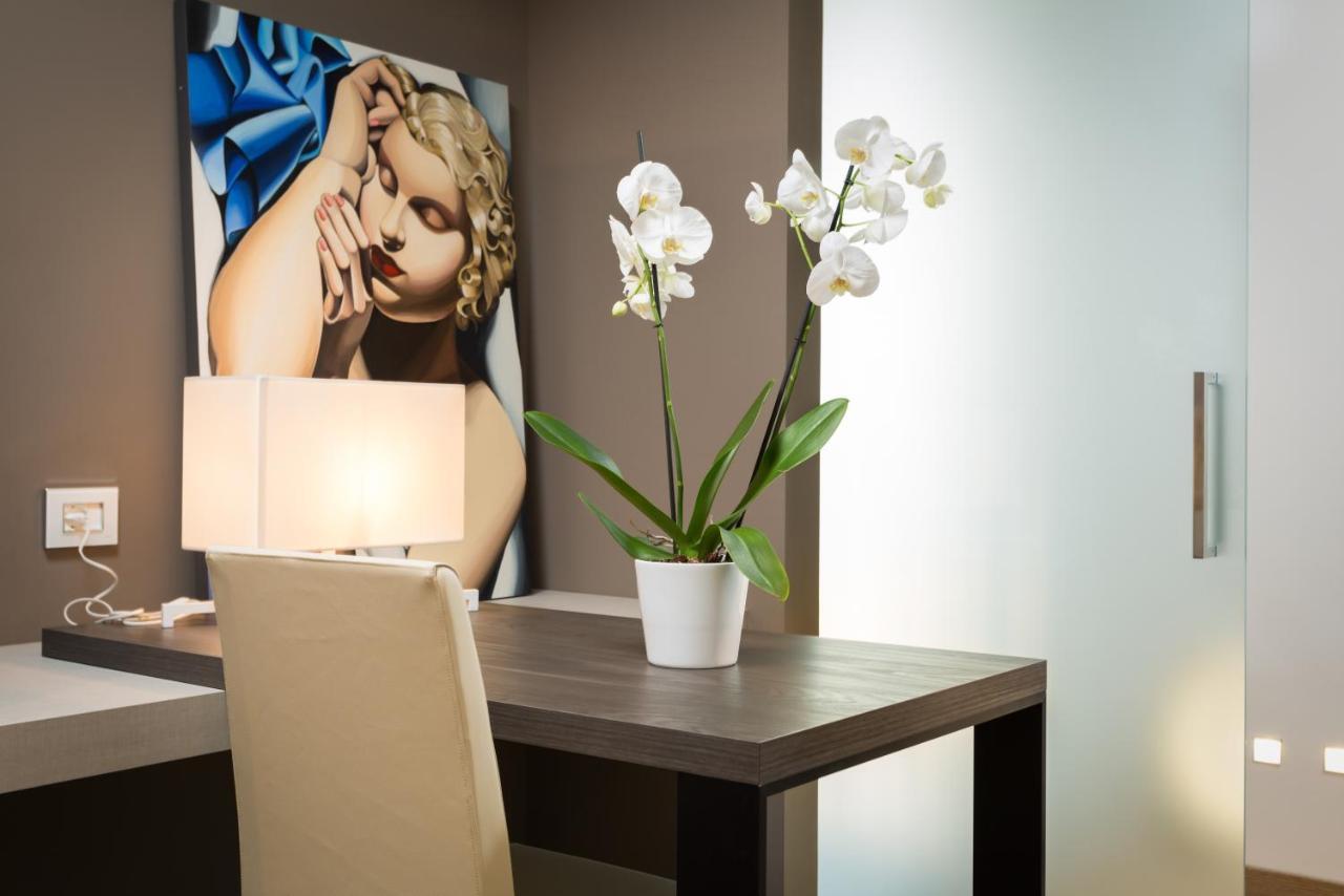Suites Hotel Astor Беллуно Экстерьер фото