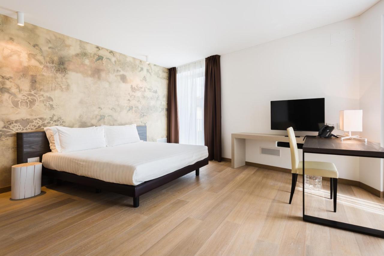 Suites Hotel Astor Беллуно Экстерьер фото