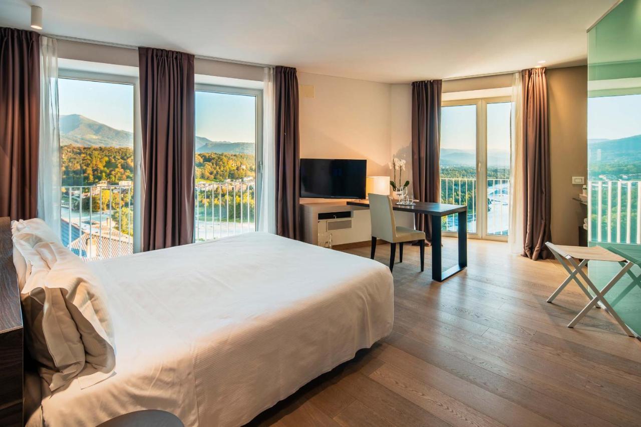 Suites Hotel Astor Беллуно Экстерьер фото